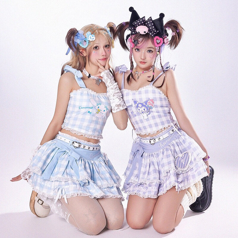 Two-kawaii-fashion-guru-wearing-cinnamoroll-and-kuromi-summer-outfits-with-knee-on-floor-gesture