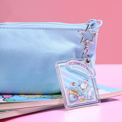 Cinnamoroll-Pochacoo-Hangyodon-Acrylic-Shaker-Keychains-With-Star-Shaped-Clasp-Hanging-On-Pencil-Case