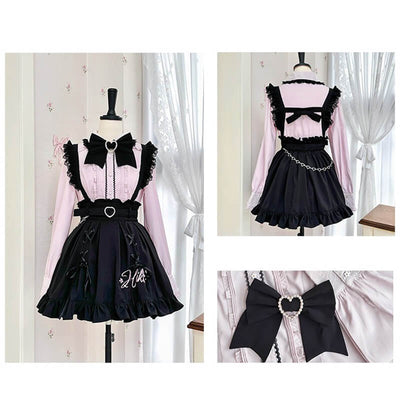 Black and pink dress with ruffles and bow details on a mannequin against a white curtain background.