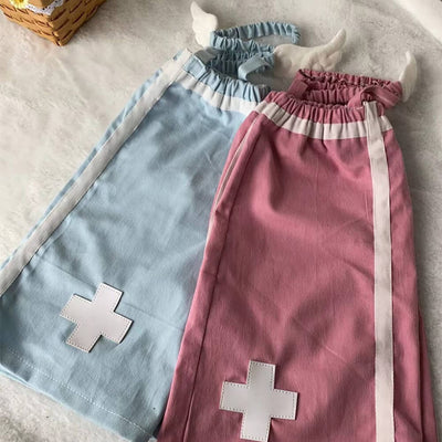 Pink-Blue-Pastel-Medical-Cross-Leg-Warmers-Under-Natural-Light