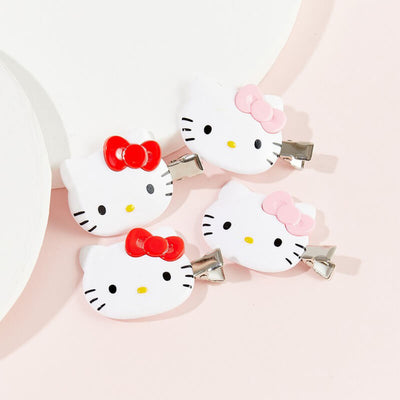 Sanrio-Hello-Kitty-Face-Alligator-Hair-Clips-Red-And-Pink