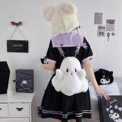a-girl-wearing-black-kuromi-dress-and-matched-with-white-ghost-stuffed-backpack
