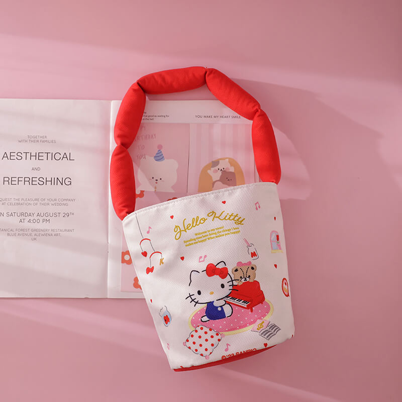 hello-kitty-piano-illustation-print-red-canvas-bucket-bag-with-cotton-filled-strap