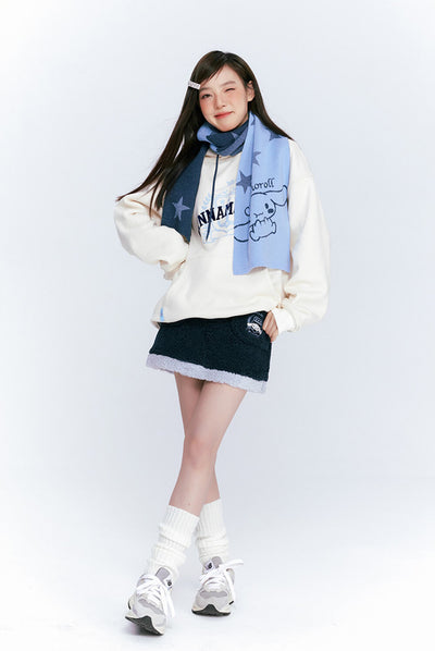 Japanese-girl-fashion-cinnamoroll-preppy-look-styled-by-cinnamoroll-white-hoodie-and-navy-blue-mini-skirt-and-cinnamoroll-blue-scarf