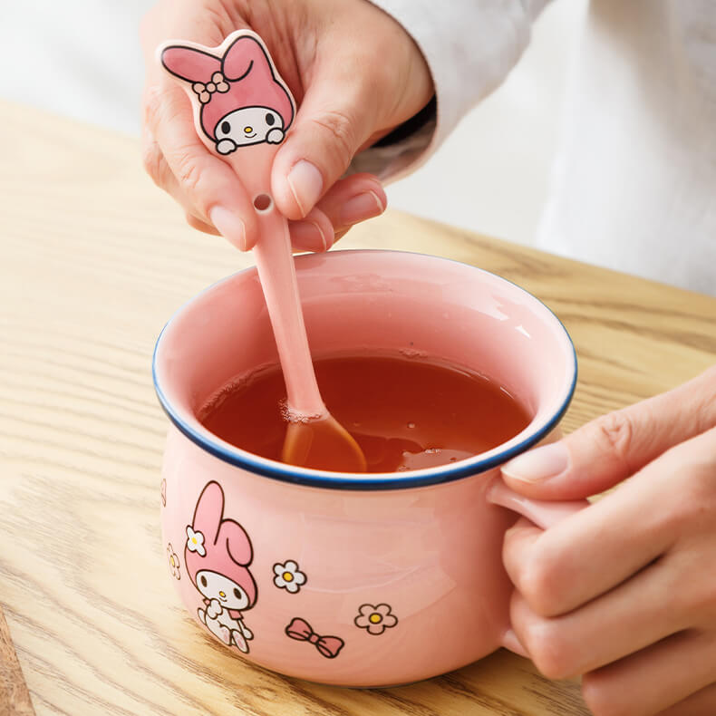 https://kawaiienvy.com/cdn/shop/products/add-childishness-to-your-daily-hydating-using-my-melody-cup-and-spoon_1400x.jpg?v=1674123374