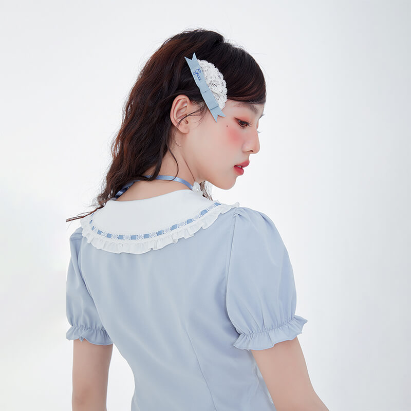 back-display-of-cinnamoroll-embroidery-lace-peter-pan-collar-puff-sleeve-blouse-with-bow-tie-in-blue