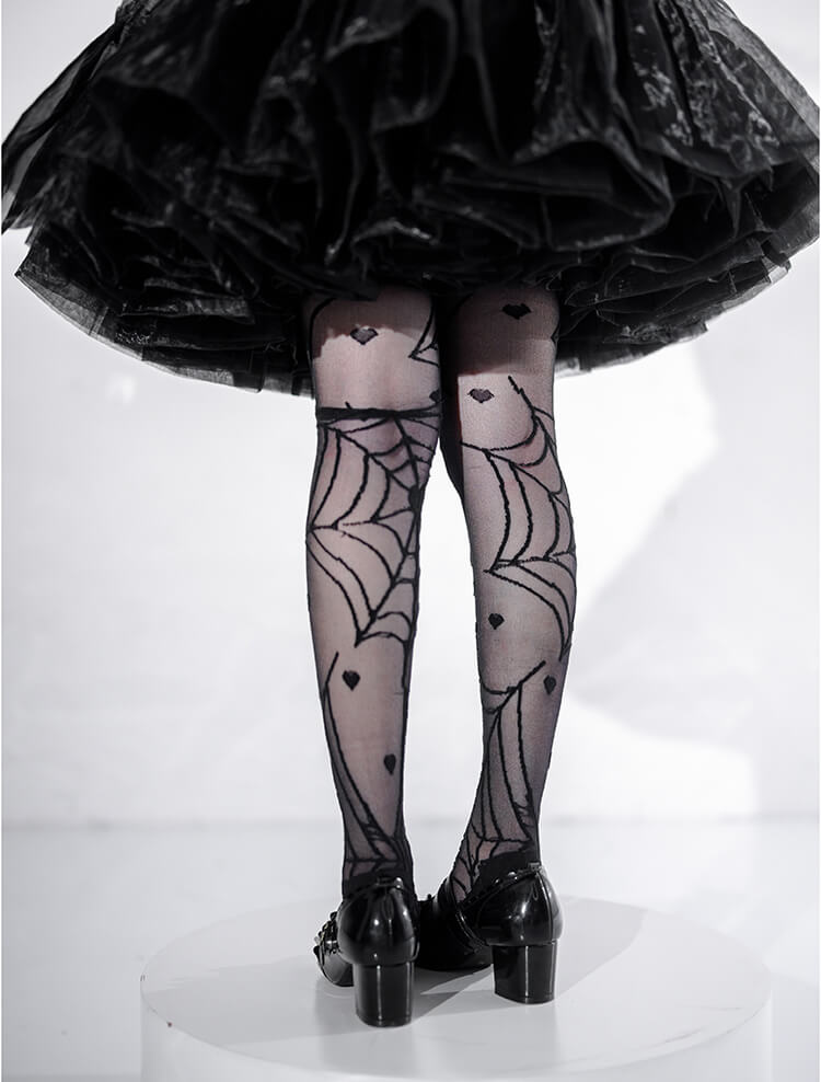 backside-dispaly-of-heart-of-croto-spider-web-over-knee-socks