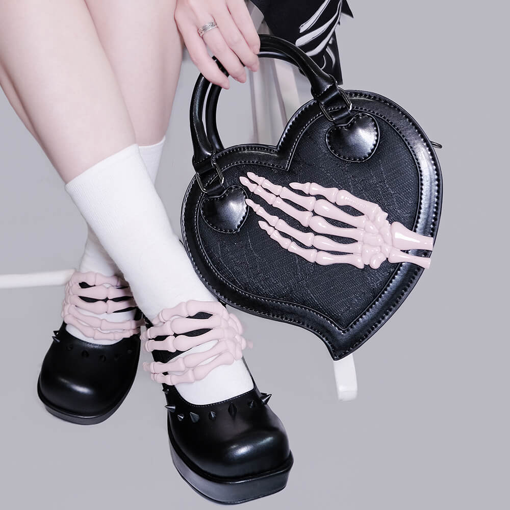 heart-shaped-pu-bag-attached-with-pink-skull-claw