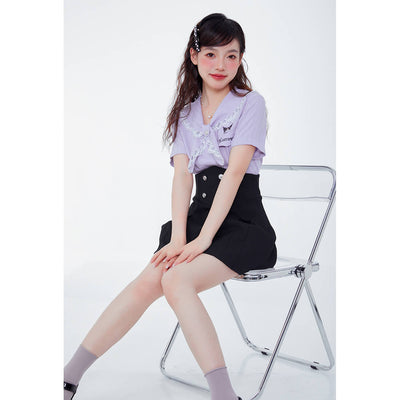 japanese-aesthetic-sitting-look-styled-by-kuromi-purple-blouse-and-kuromi-black-skirt