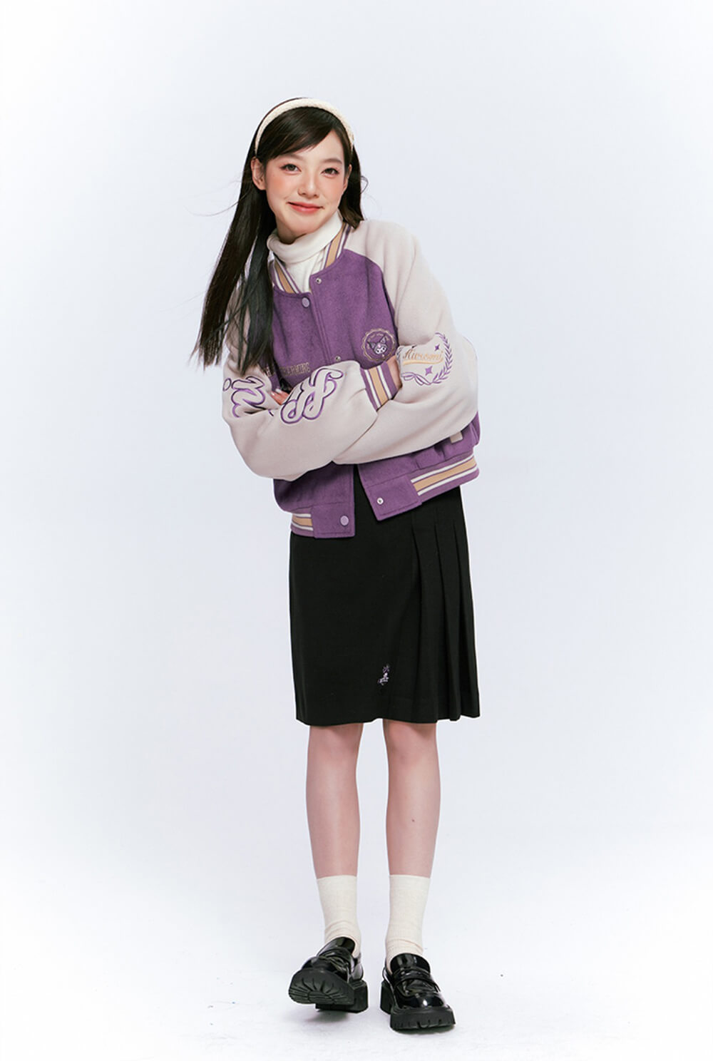 japanese-preppy-style-girl-outfit-styled-by-kuromi-purple-varsity-jacket-and-kuromi-black-pleated-skirt
