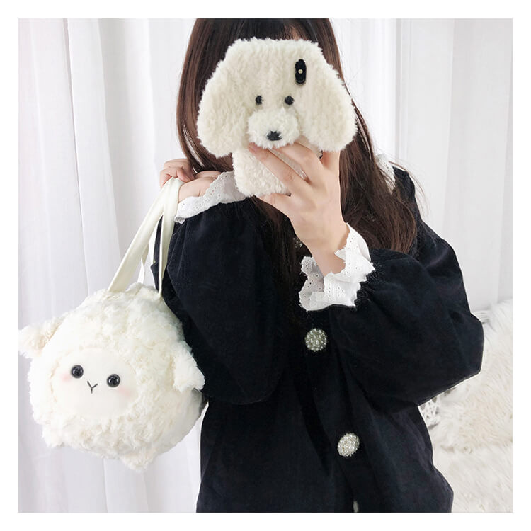 lovely-white-sheep-plush-handbag-with-ribbon-hanging-by-a-girl