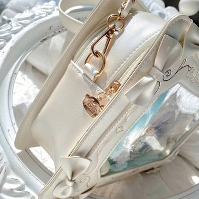 retro-square-shape-picture-frame-ita-bag-white-color-bows-and-zippers-details