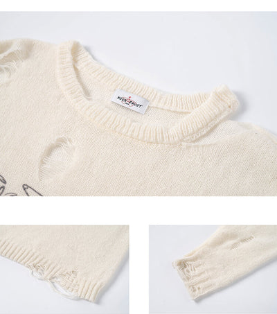 round-neck-and-cuff-details-of-the-punk-bleeding-love-ripped-sweater-in-ivory