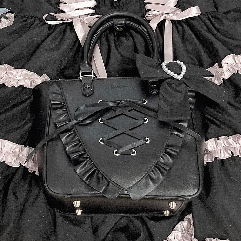 studs-decorated-at-bottom-of-the-ribbon-lace-up-pu-ita-tote-bag-in-black