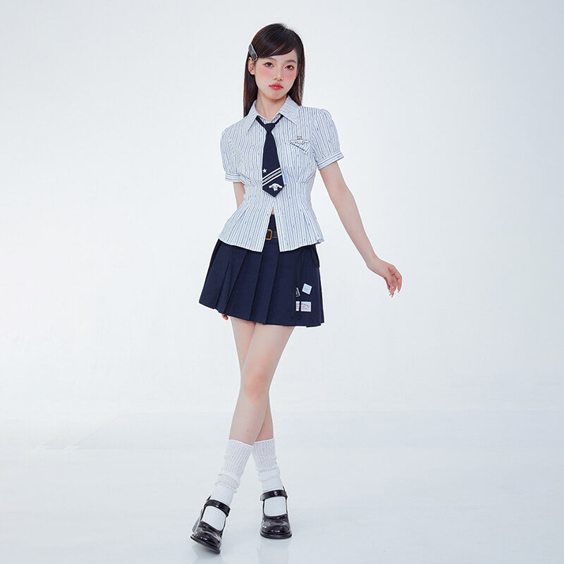 sweet-girl-fashion-look-styled-with-blue-white-striped-cinnamoroll-shirt-and-navy-pleated-mini-skirt-and-cinnamoroll-necktie