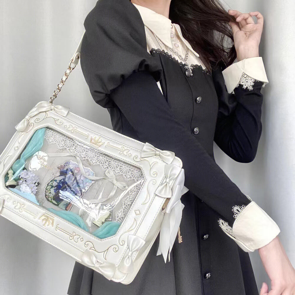 white-color-retro-square-shape-picture-frame-ita-bag-matched-with-black-dress